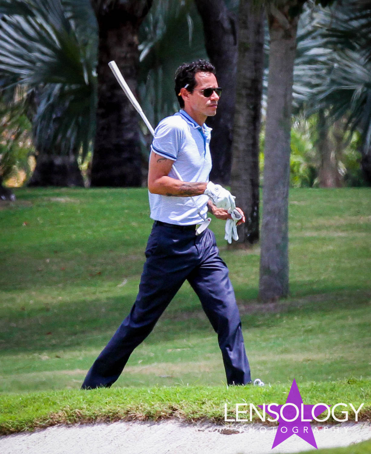 LENSOLOGY.NET - Marc Anthony has a game of golf with a group of pals during a sunny afternoon. Miami, FL.
All images are copyright of Lensology.net
Email: info@lensology.net
www.lensology.net
